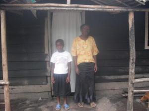 Synthia and her mother, the day we met her for the first time and visited her home