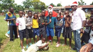 The winning team posing with Arsene Tungali and Santa