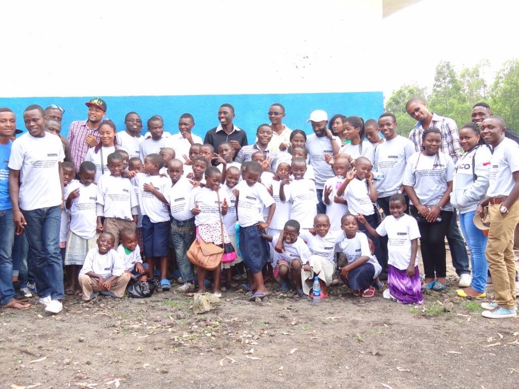A picture of Rudi International Volunteers and beneficiary children rejoicing together as they remember the birth of Christ and the meaning of giving of oneself to others.